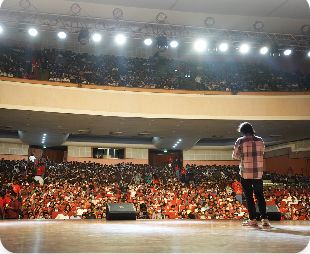Career Circle speaker addressing a large student audience